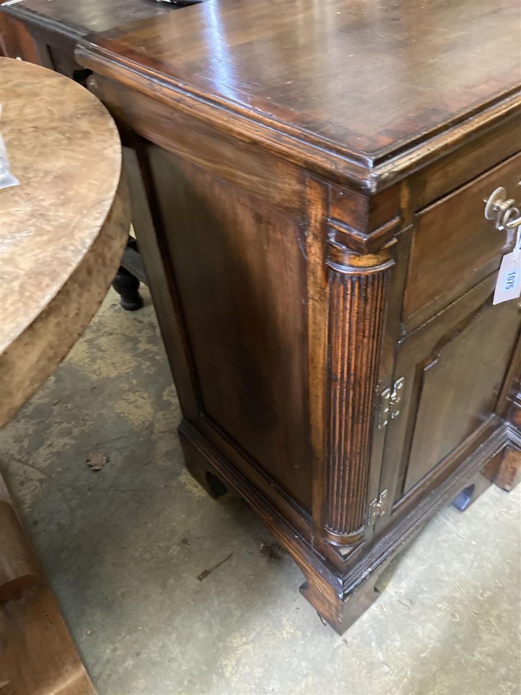 An 18th century style oak breakfront low dresser base, width 148cm, depth 47cm, height 83cm